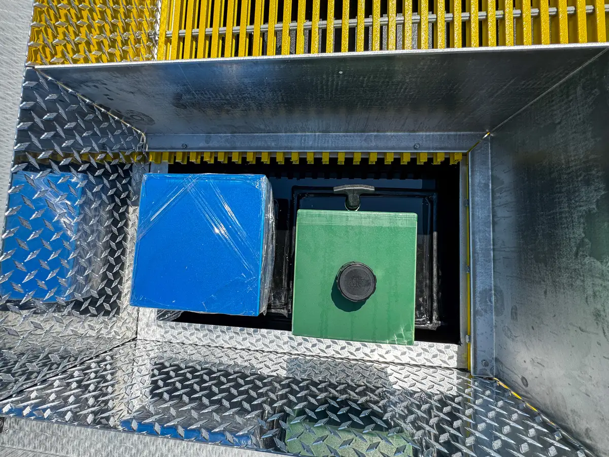 Top deck forward view over yellow grating toward cab roof.